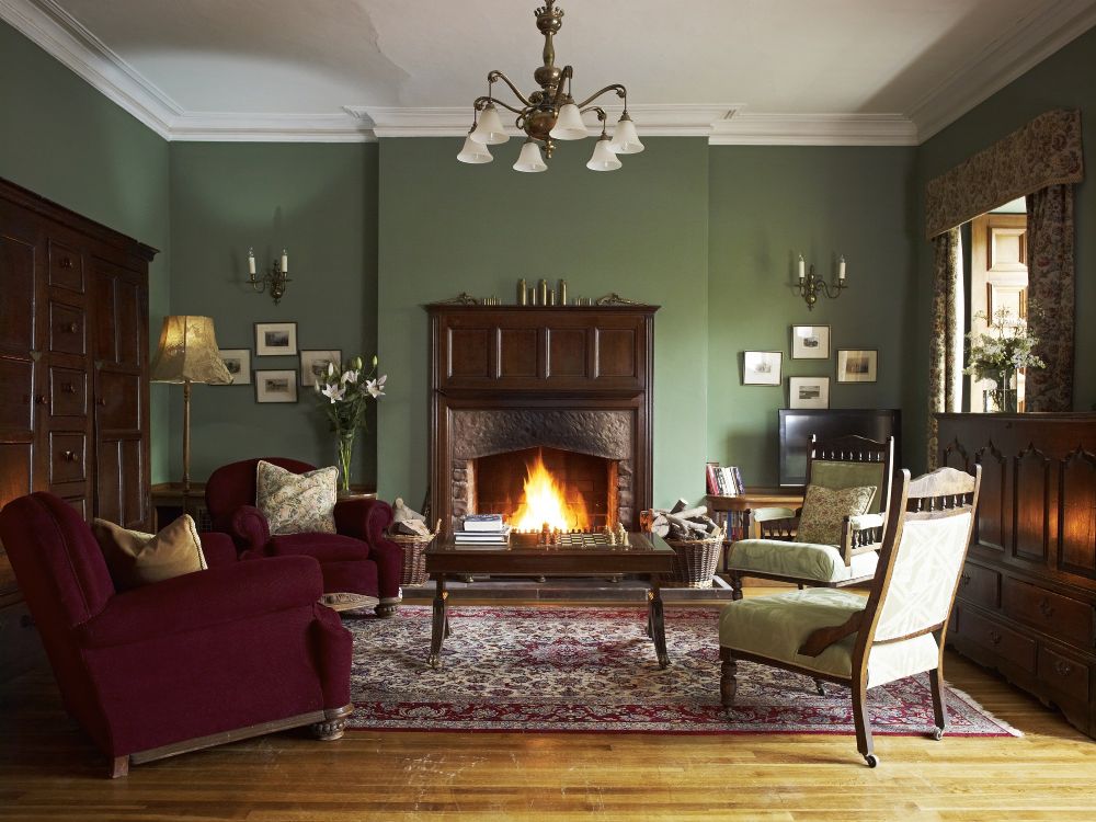 Melmerby Hall oak panelled library self catering holiday home near Lake District National Park with open fire family holidays wedding venue corporate breaks at The Rowley Estates