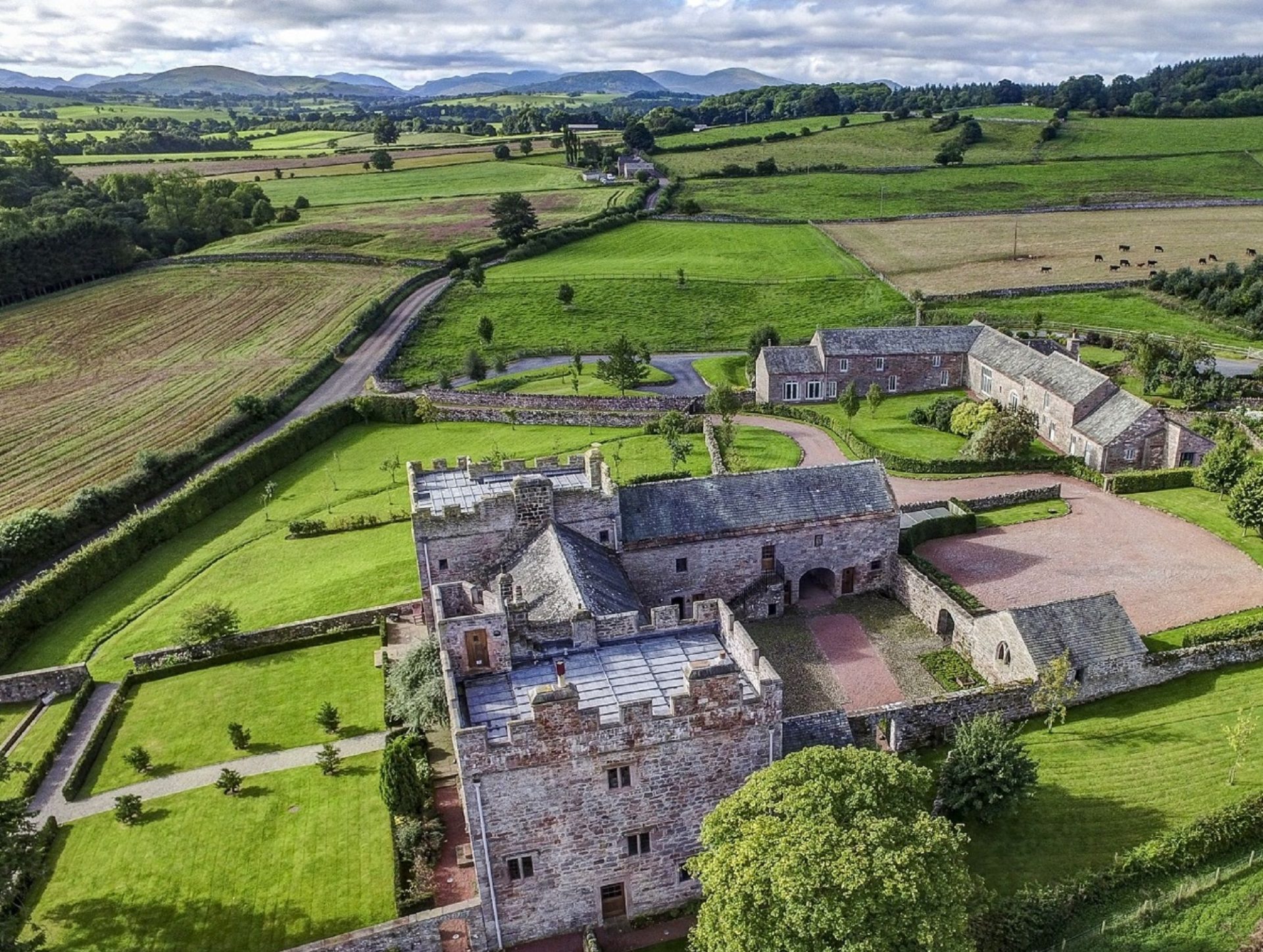 Blencowe Hall and its Grade II listed barns including Cazenovia Hall