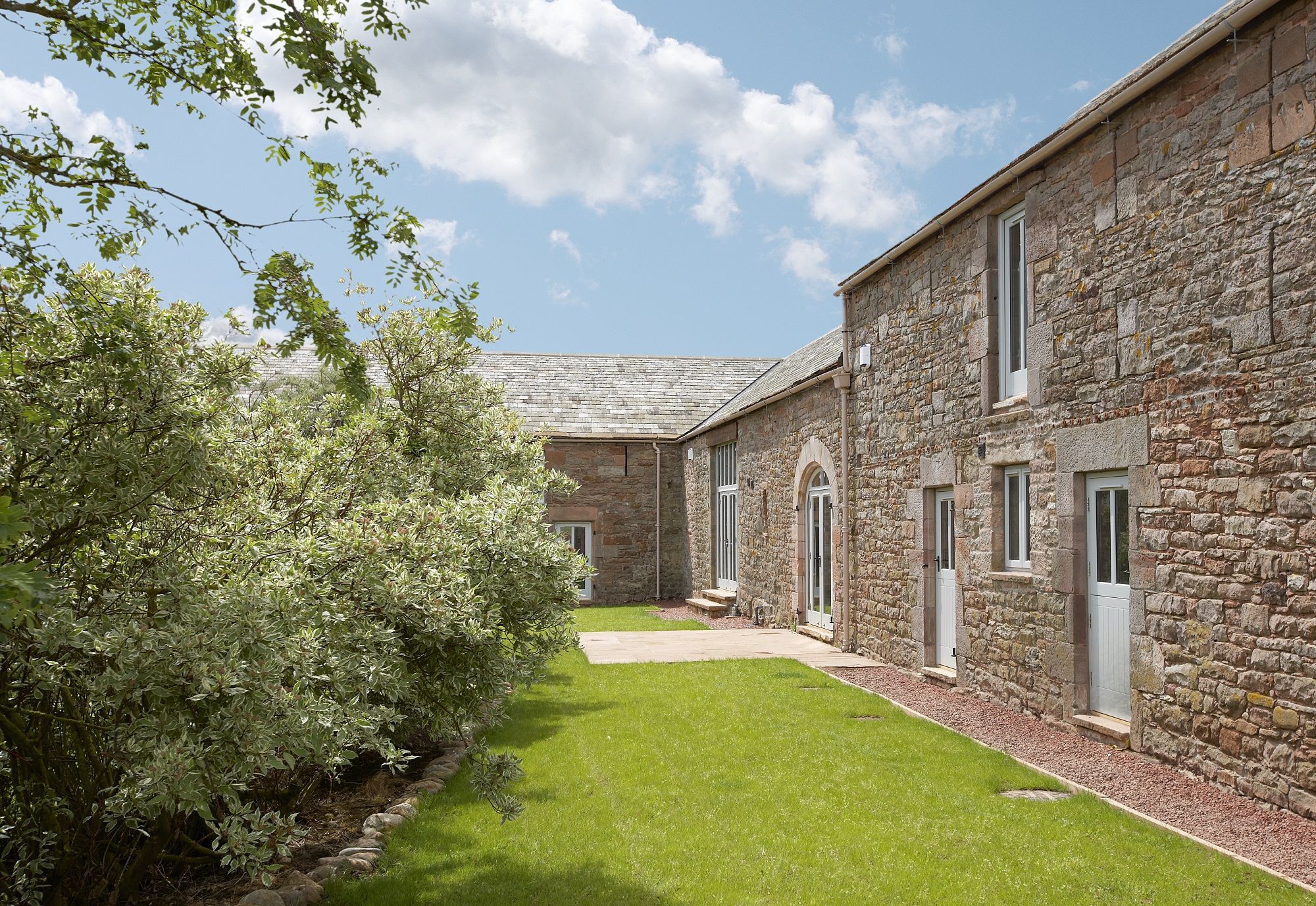 Cazenovia Hall inner courtyard garden luxury holiday cottage at The Rowley Estates