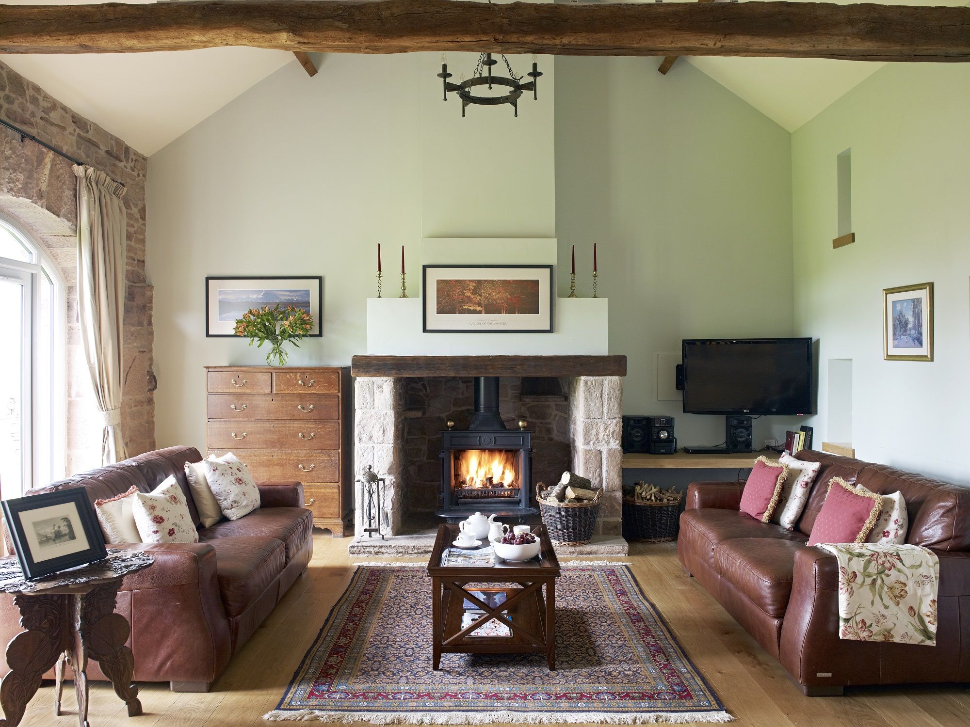 Riverain Coach House self catering holiday cottage with open fire logs provided for family holidays dogs welcome exclusive use private gardens and parking at The Rowley Estates