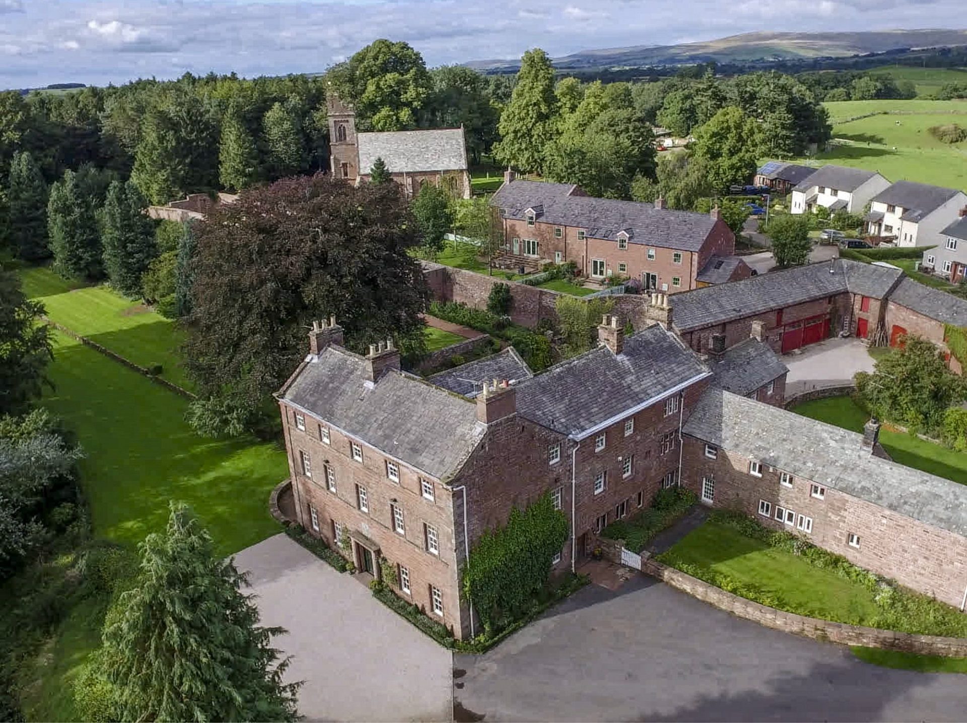 Stag Cottage and Melmerby Hall aerial view of luxury holiday cottage at The Rowley Estates families welcome
