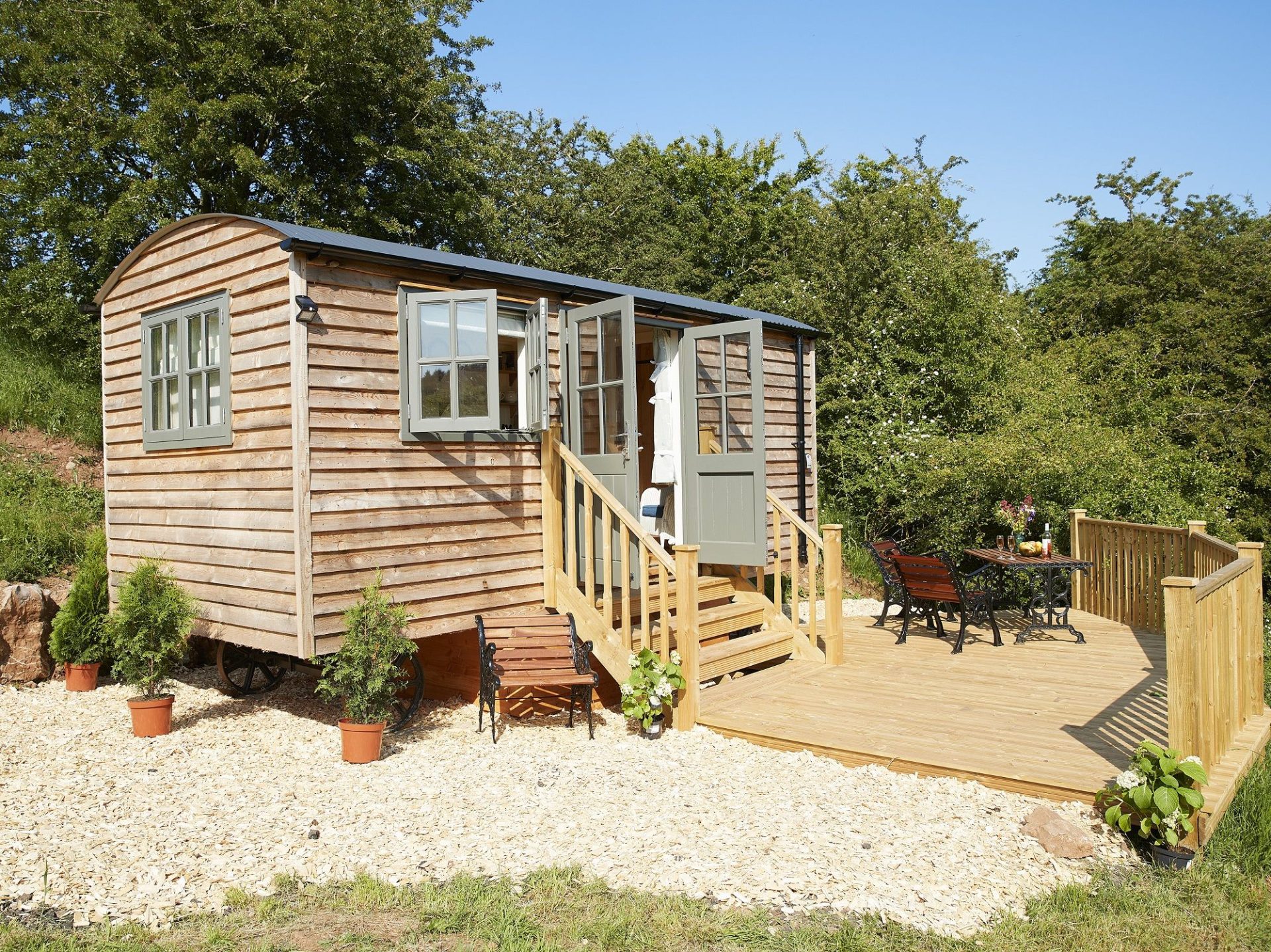 Elm Retreat luxury glamping shepherds hut at The Rowley Estates near the Lake District National Park private wooden deck river front access and woodland