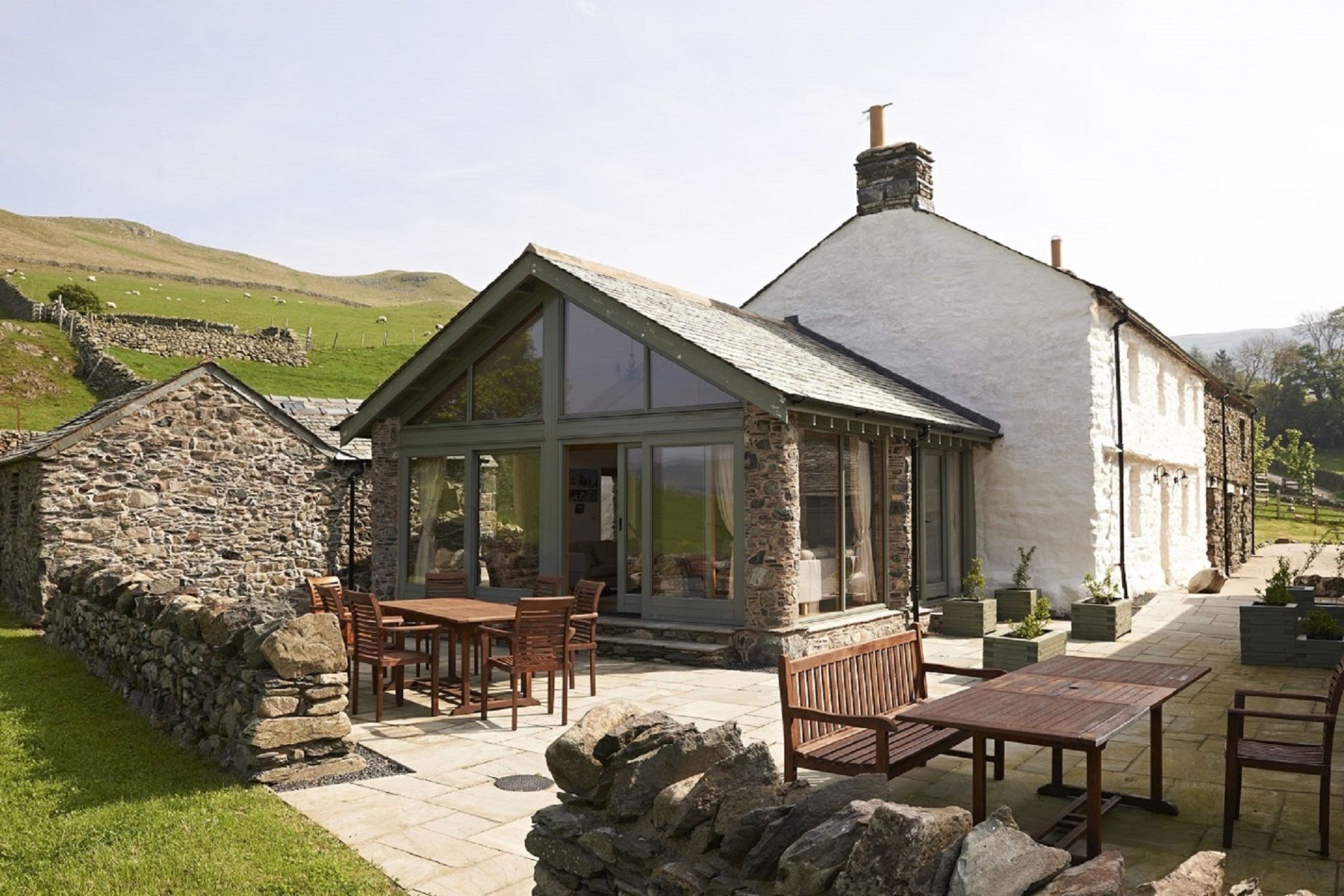 Hause Hall Farm sandstone terrace at luxury holiday cottage in Lake District National Park at The Rowley Estates