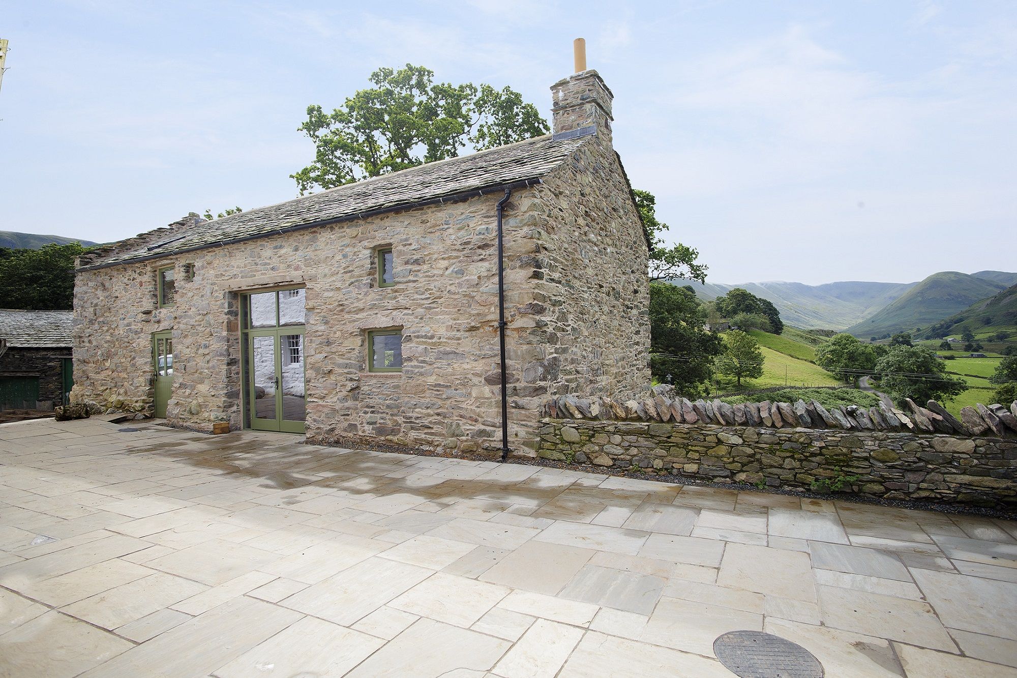 Sandstone terrace and Cruik Barn at Hause Hall Farm two ensuite bedrooms in detached cottage