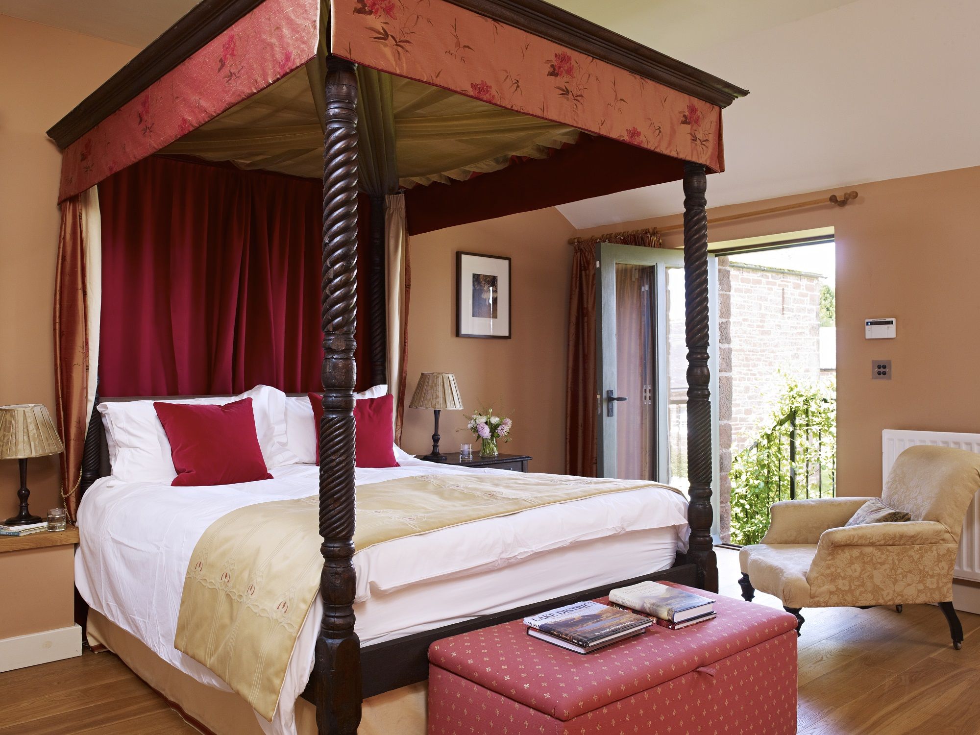Glassonby Old Hall ensuite Master Bedroom with king size four poster bed ensuite with roll top bath at The Rowley Estates
