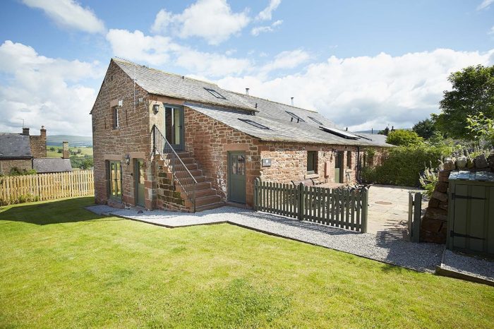 elk-cottage-view-from-garden-to-sandstone-terrace-dog-friendly-holiday-rental-lake-district