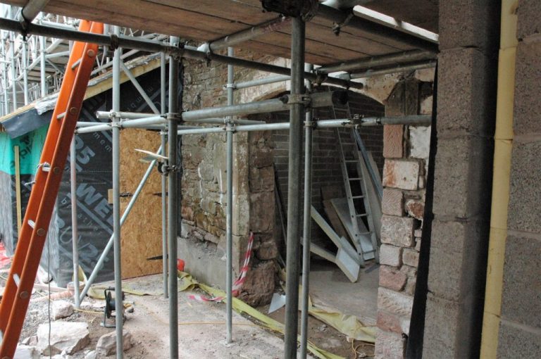 Wythburn-cottage-doorway-opening-to-rear-terrace-before-restoration-1024×680