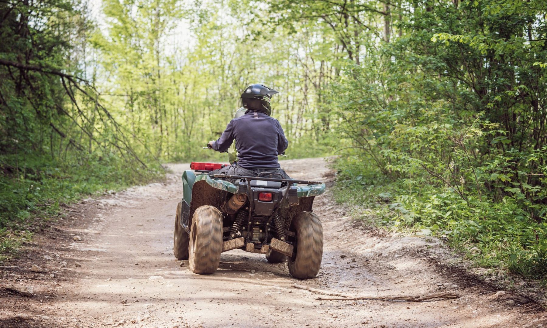 bigstock-Man-On-The-Atv-Quad-Bike-113282585