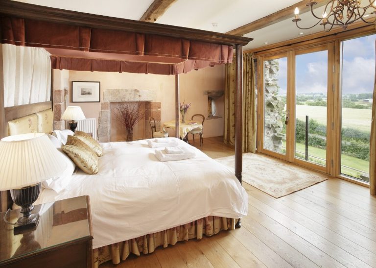 blencowe-hall-south-tower-master-bedroom-amazing-rural-view-four-poster-bed-balcony-lake-district