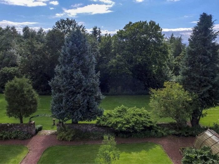 Enjoy privacy and freedom to roam the wooded estate