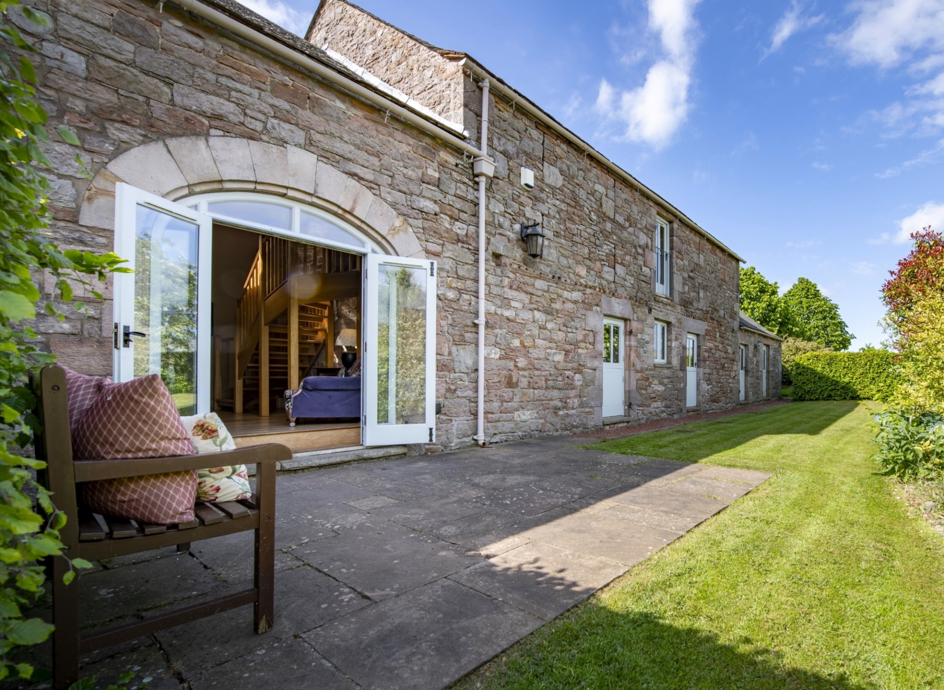 Wythburn Cottage second sandstone terrace garden opening from kitchen