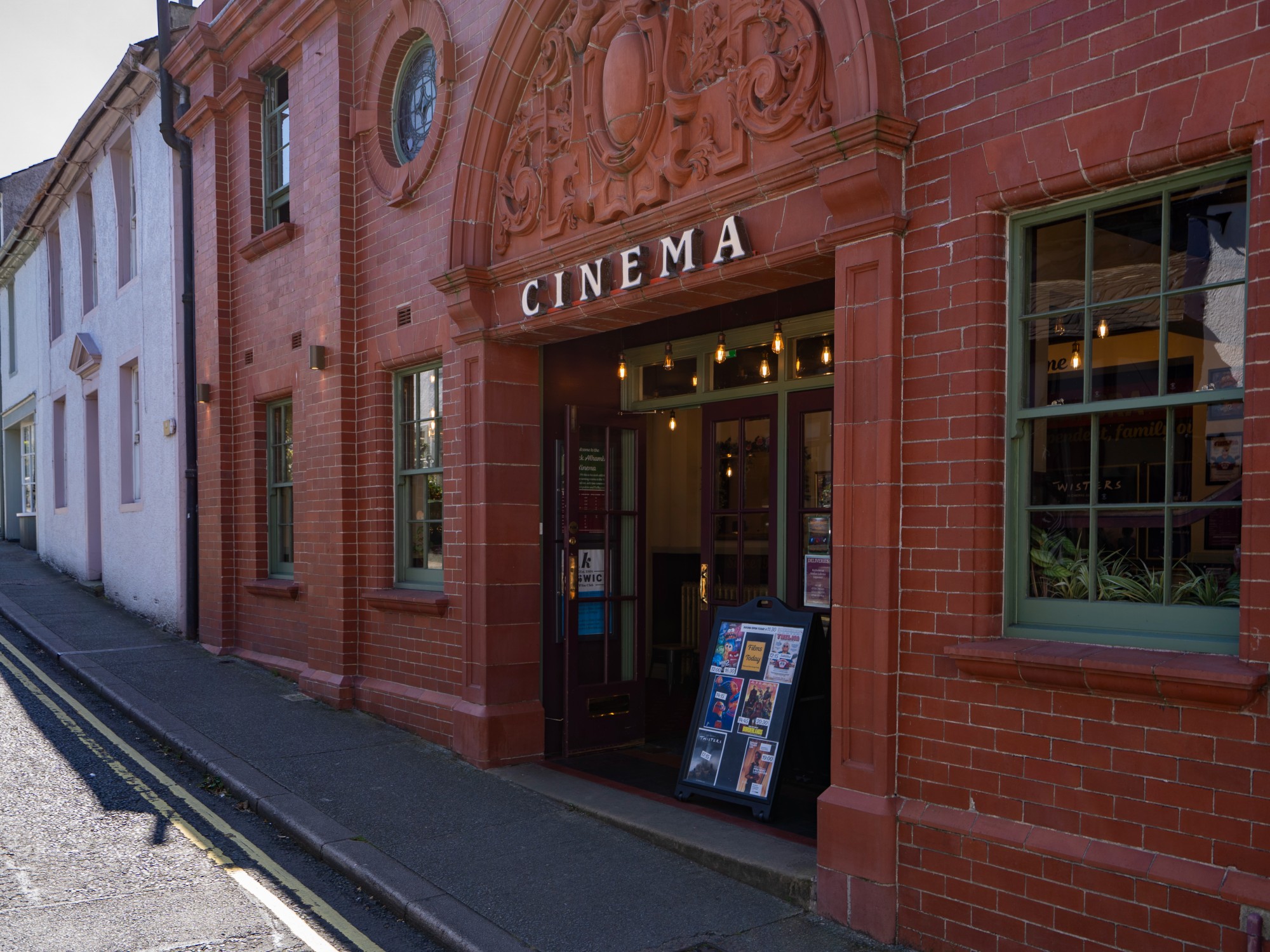 alhambra cinema outside building brick vintage old