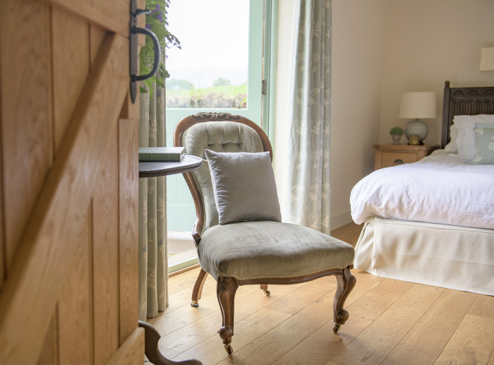 Loweswater ensuite bedroom at Gill Beck Barn opens to private enclosed garden