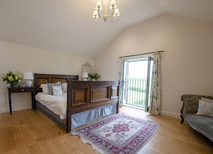 The Elterwater ensuite bedroom on first floor of Gill Beck Barn
